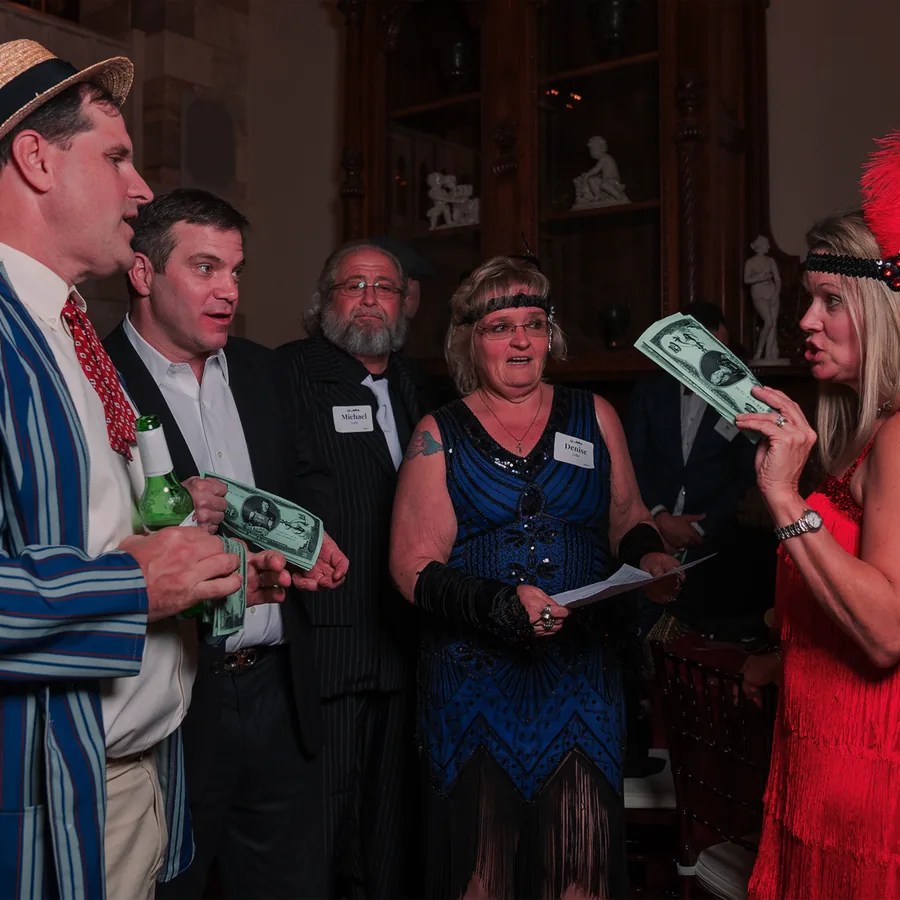 Guests at a Murder Mystery Company public dinner show in Tampa